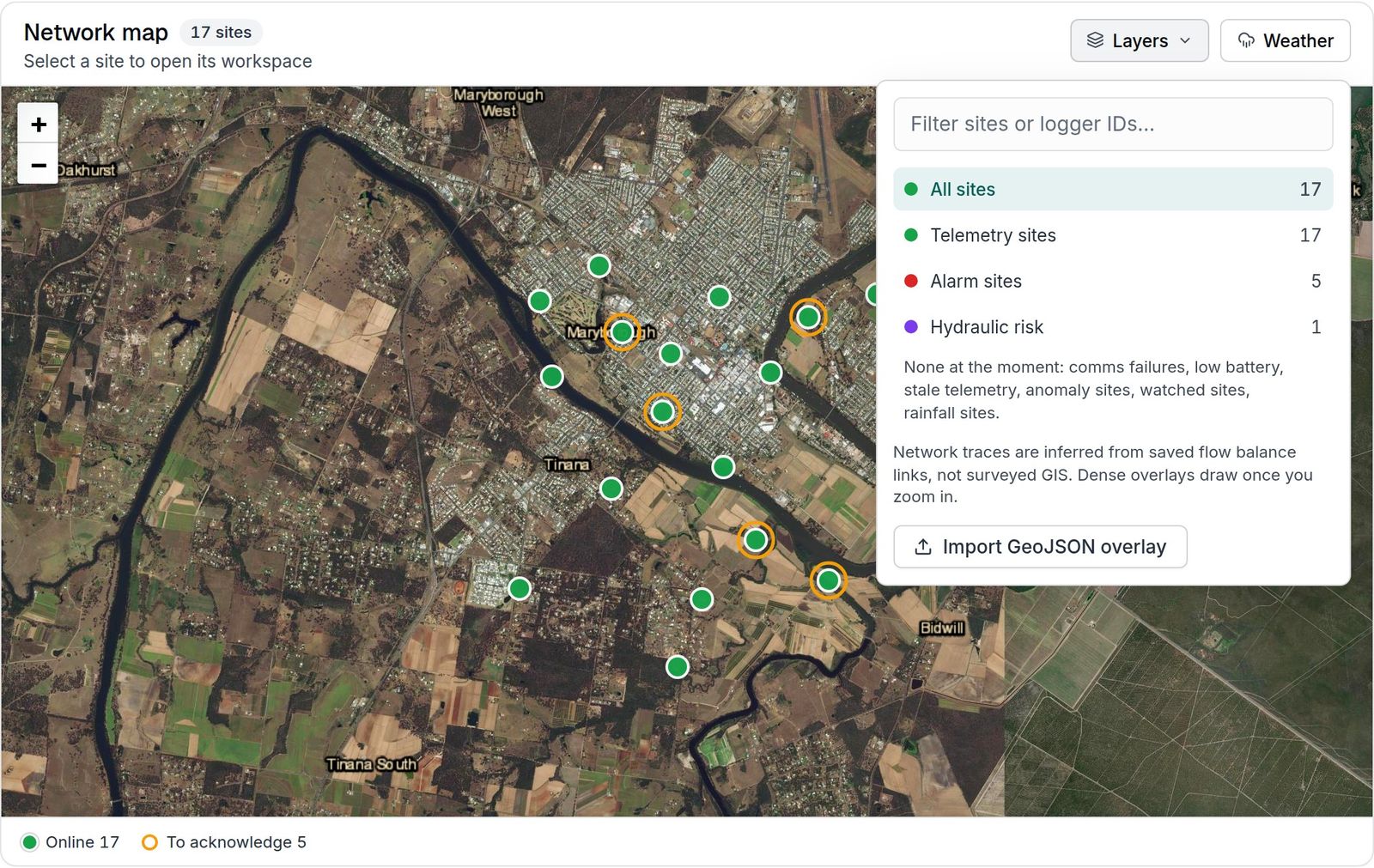 The FlowSense network map on aerial imagery, with the Layers panel narrowing it to alarms, telemetry, battery and hydraulic risk.